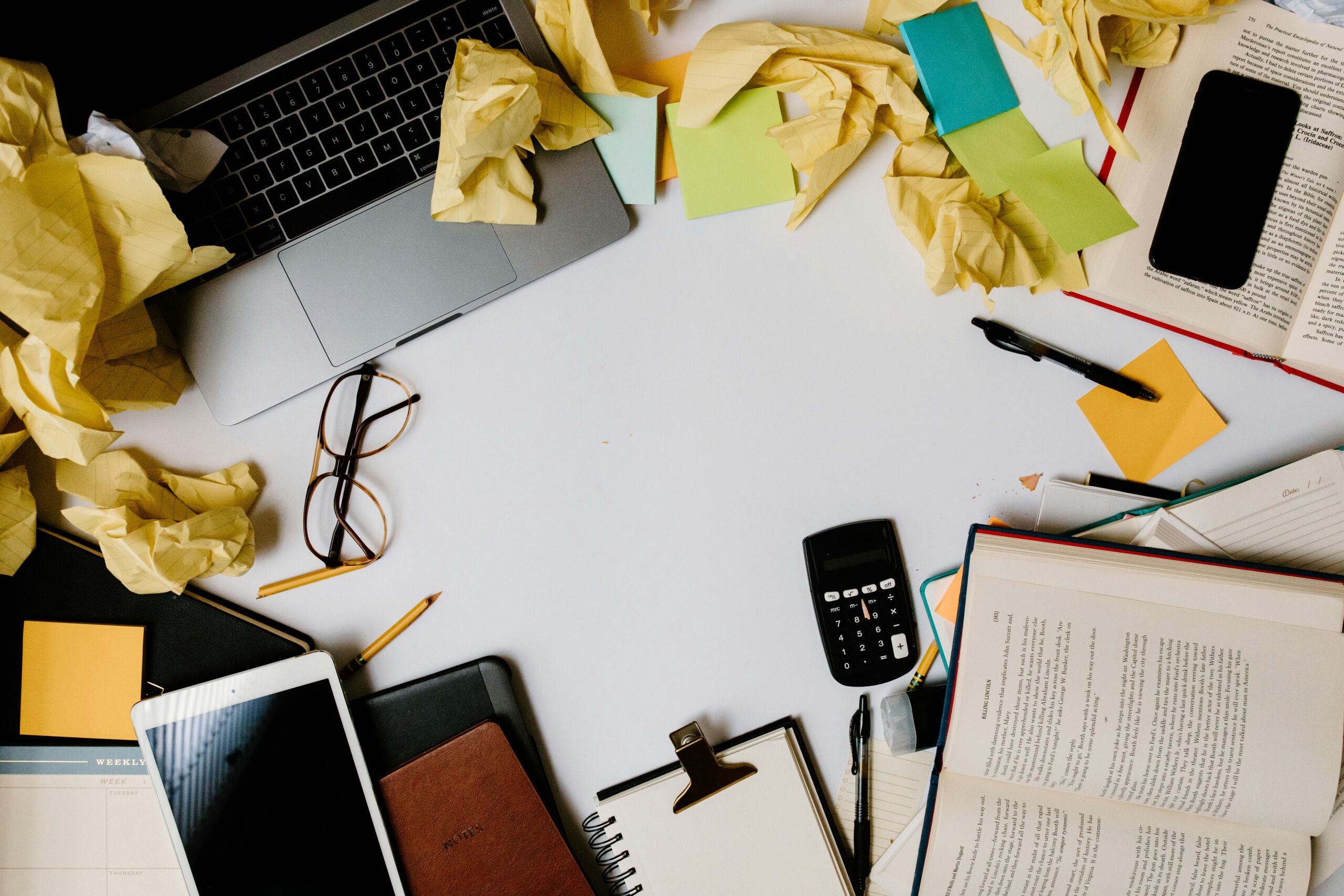 A cluttered office desk.