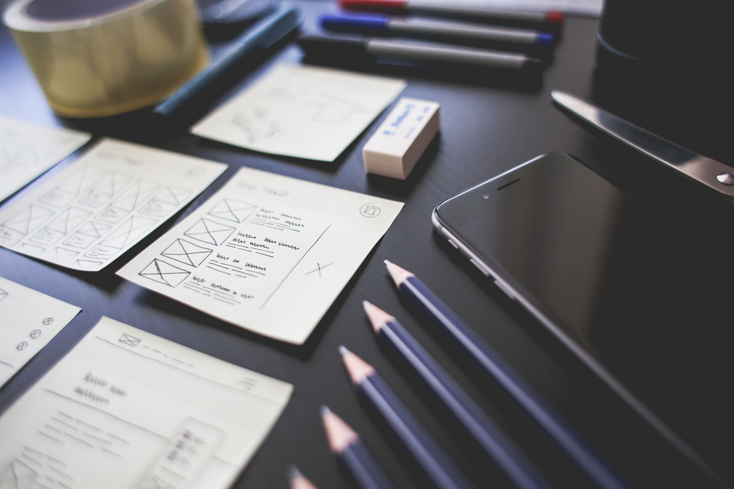 organized paper and pencils on a table